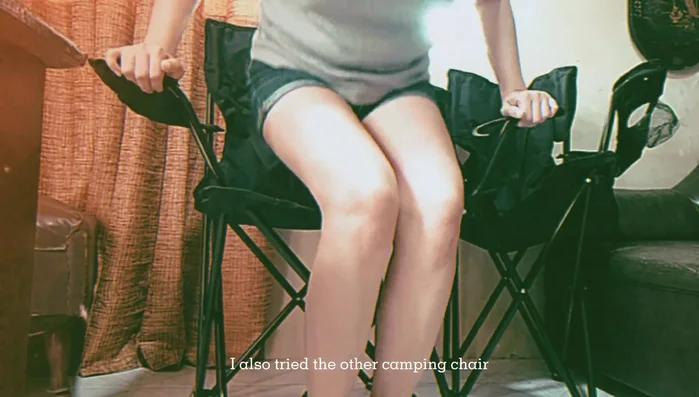 Demonstrates placement of a water bottle on the chair.