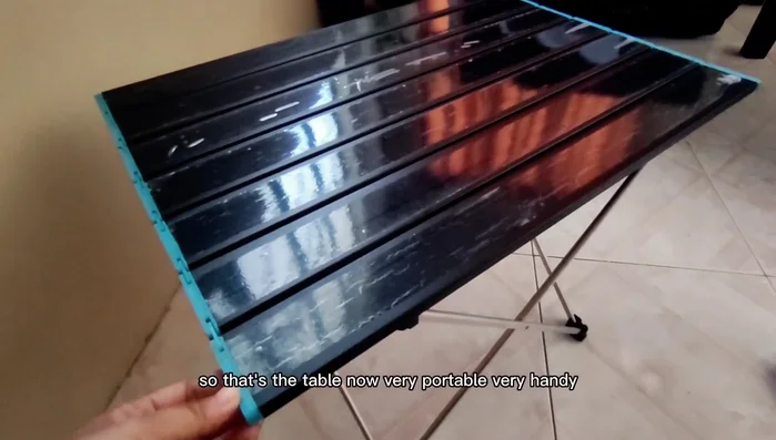 Unboxing and initial inspection of the camping table.