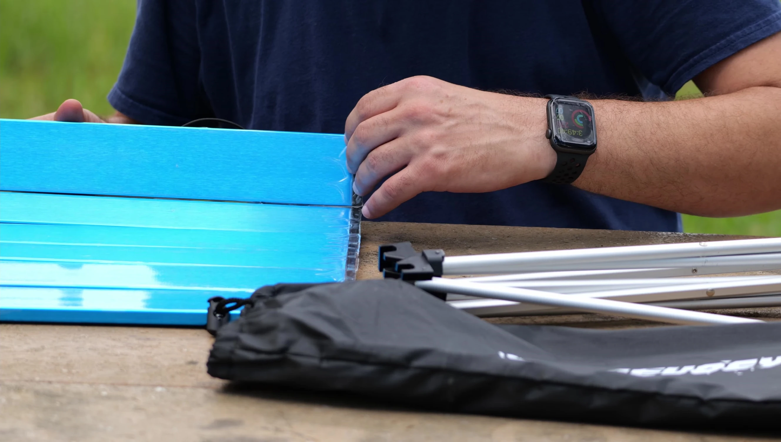 Close-up of the table slats with protective film still on.