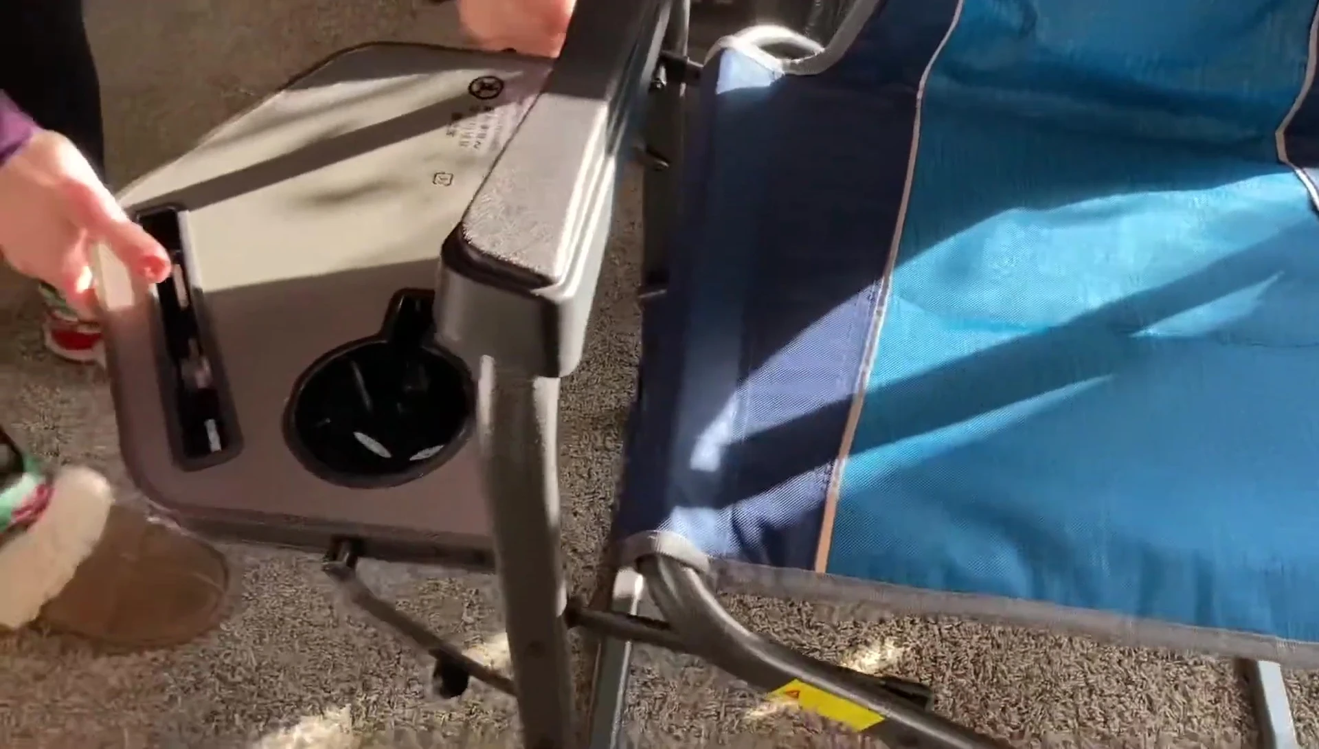 Close-up view of the side tray, highlighting its functionality.