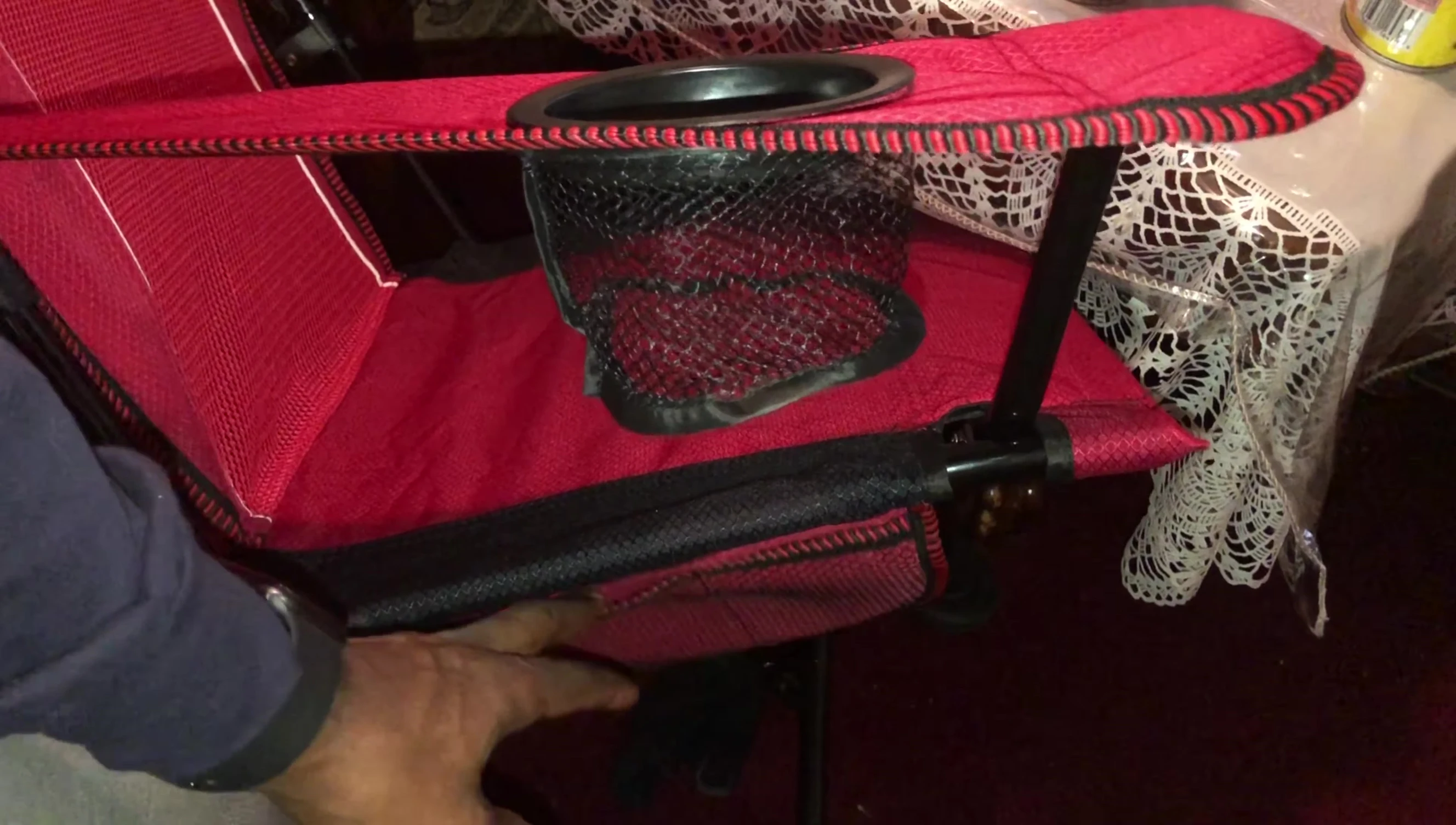 View of the small side pouch for glasses and phone.