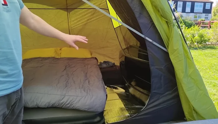 Use silver-backed foil blankets under your air mattress to insulate against cold nights.