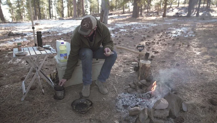 Place the skillet on the fire and bring the water to a boil.