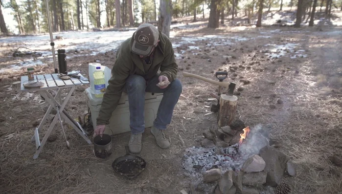 Place the skillet on the fire and bring the water to a boil.
