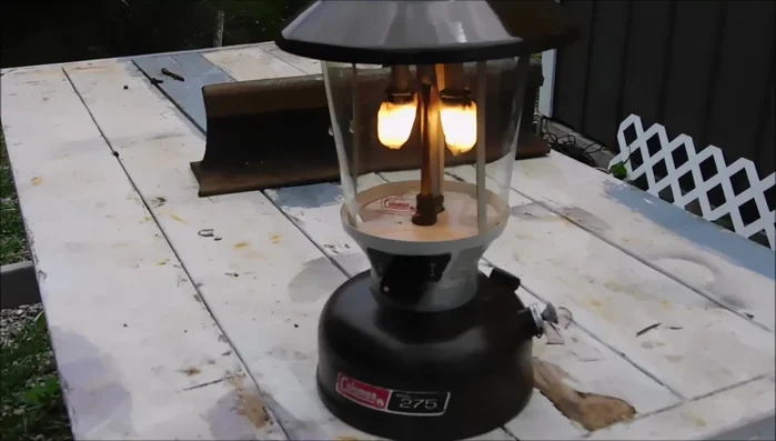 Light the lantern: Pump up the lantern and light the mantles.