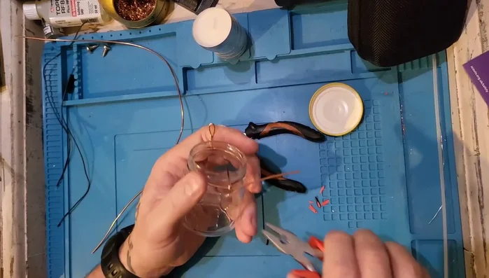 Create a small handle loop on the opposite end of the wire.