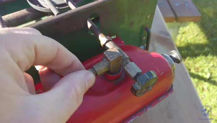 After one minute (or sooner if conditions allow), turn the choke knob down. The flames should turn blue.