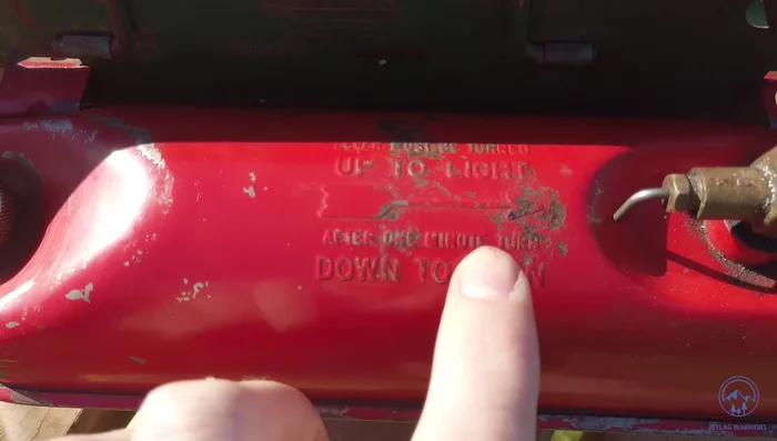 After one minute (or sooner if conditions allow), turn the choke knob down. The flames should turn blue.