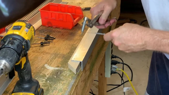 Mark, drill, and rivet the four support pieces together.