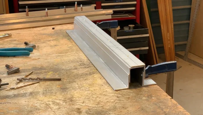 Mark, drill, and rivet the four support pieces together.