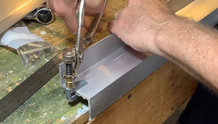 Cut the aluminum angle into eight 2ft long pieces.