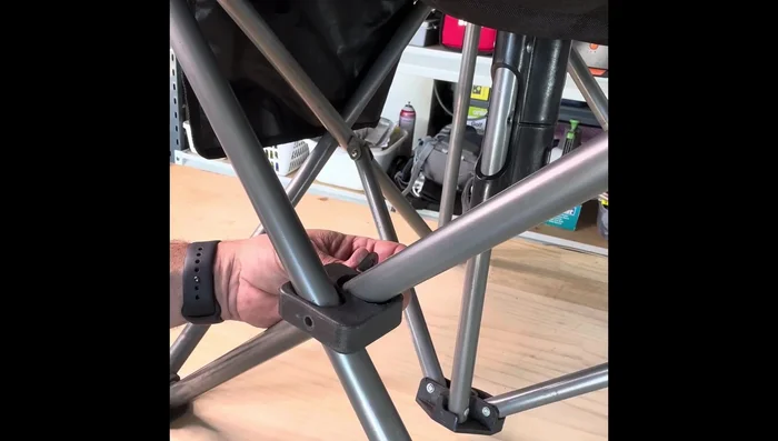 Insert the bolt through the bracket and attach it to the chair frame.
