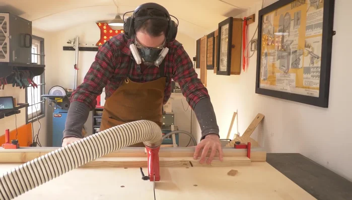 Cut dowels to size using the crosscut sled.