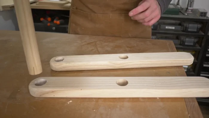 Trim the wedges flush using a Japanese saw.