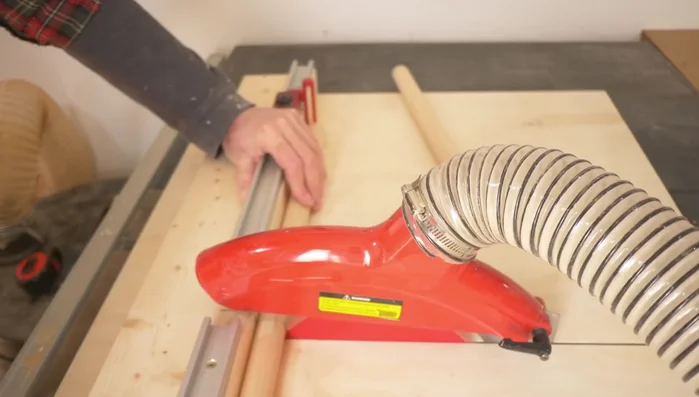 Cut dowels to size using the crosscut sled.