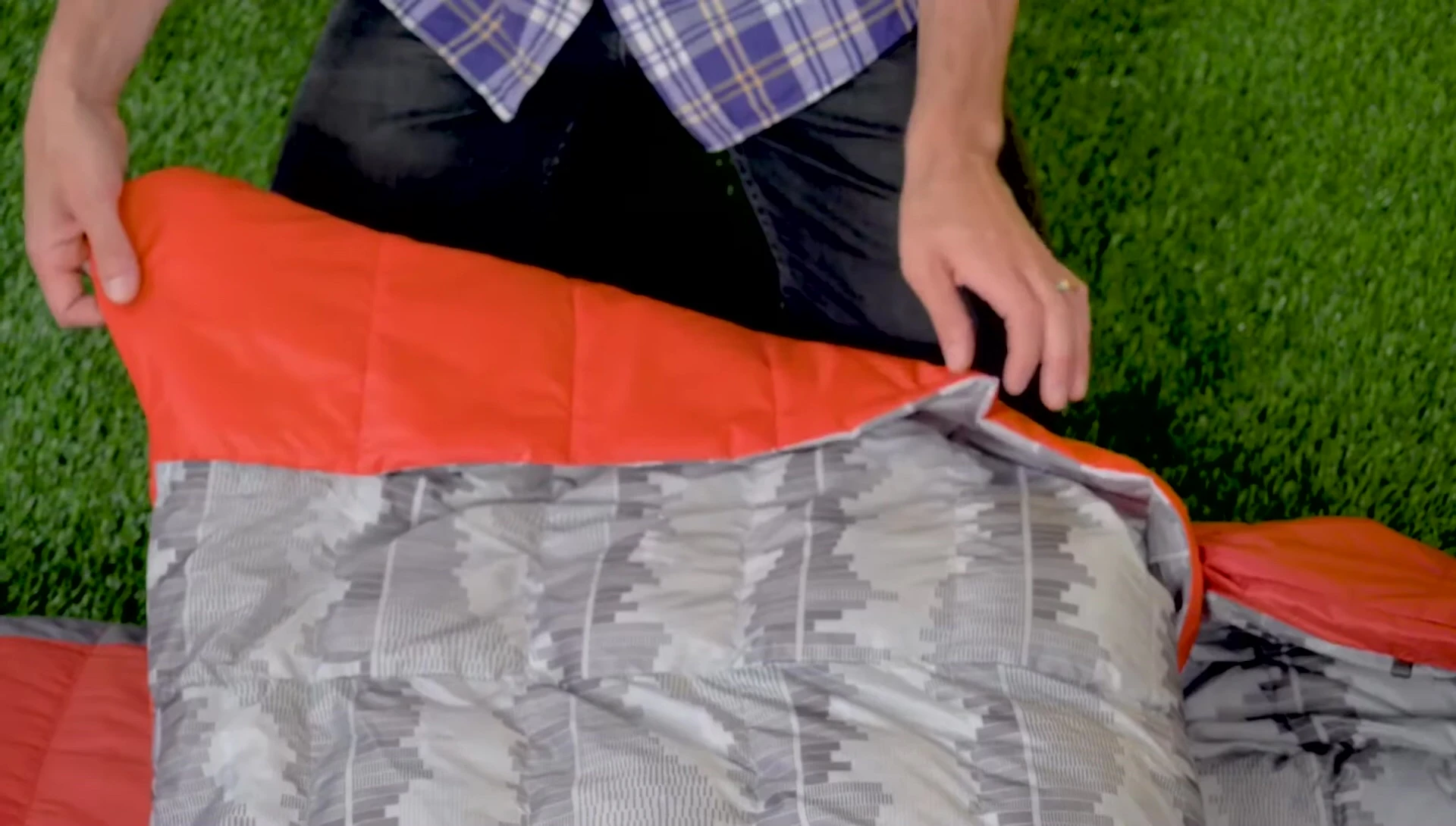 Highlighting the hand and arm pockets in the comforter.