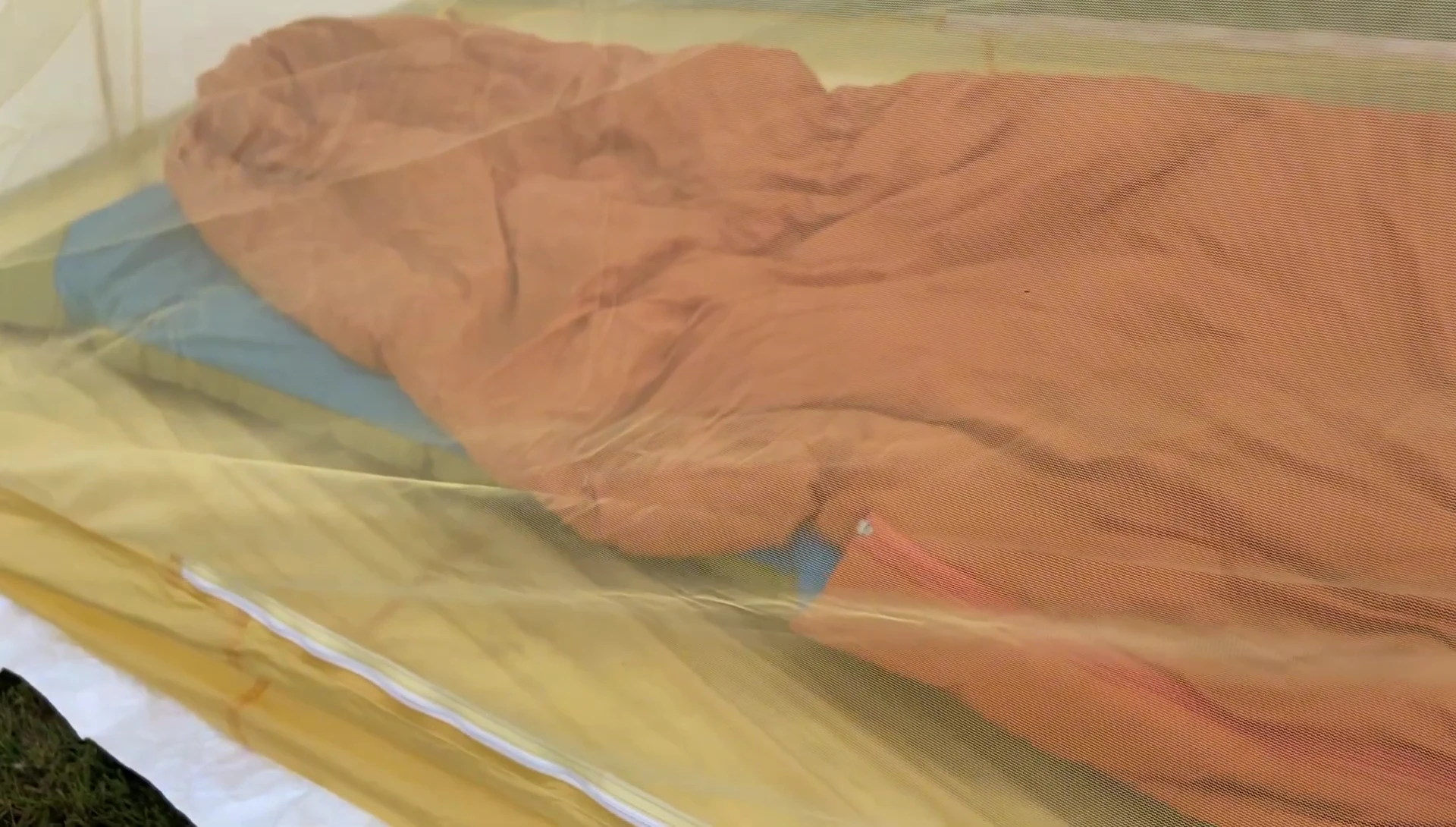 The tent packed in its stuff sack