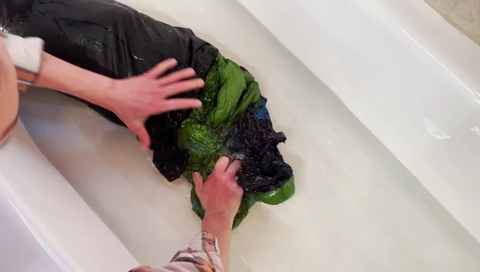 Agitate and soak: Gently agitate the sleeping bag in the soapy water to work the soap in. Let it soak for about 10 minutes.