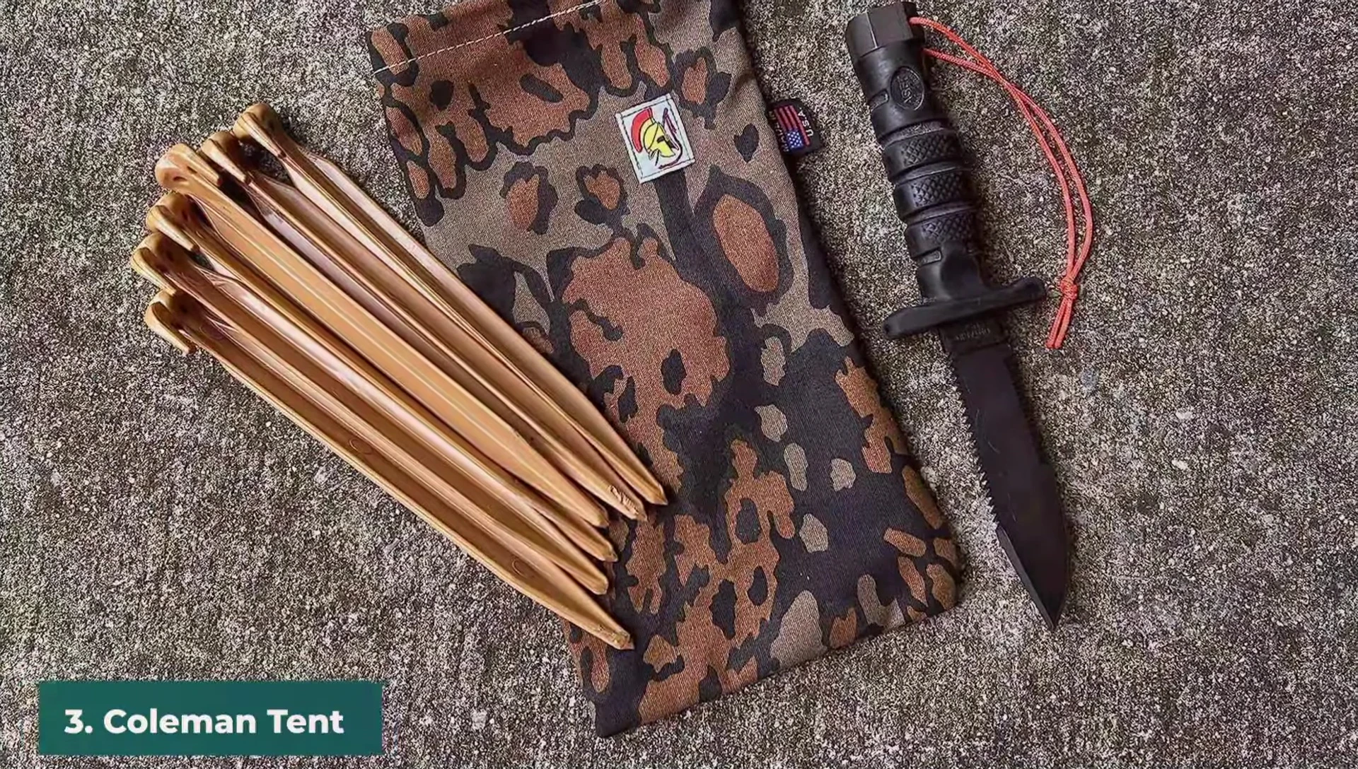 Image of Coleman Tent Pegs, showing their orange color.