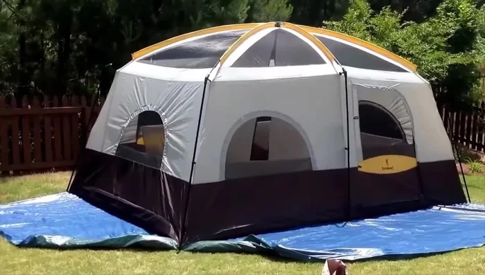 Review of the Core 11-Person Family Cabin Tent: Spacious (17 ft x 12 ft), high center height (86 inches), H2O Block technology, adjustable ventilation, attached screen room.