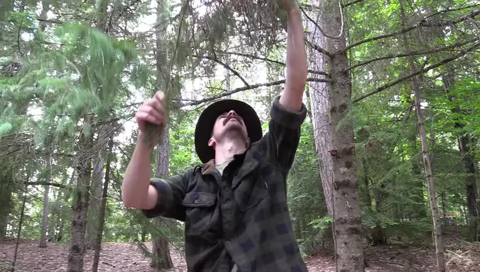 Tighten the side ropes and center rope to straighten the tarp and create a taut setup.