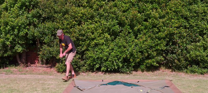 Fold the rain fly neatly and pack it.