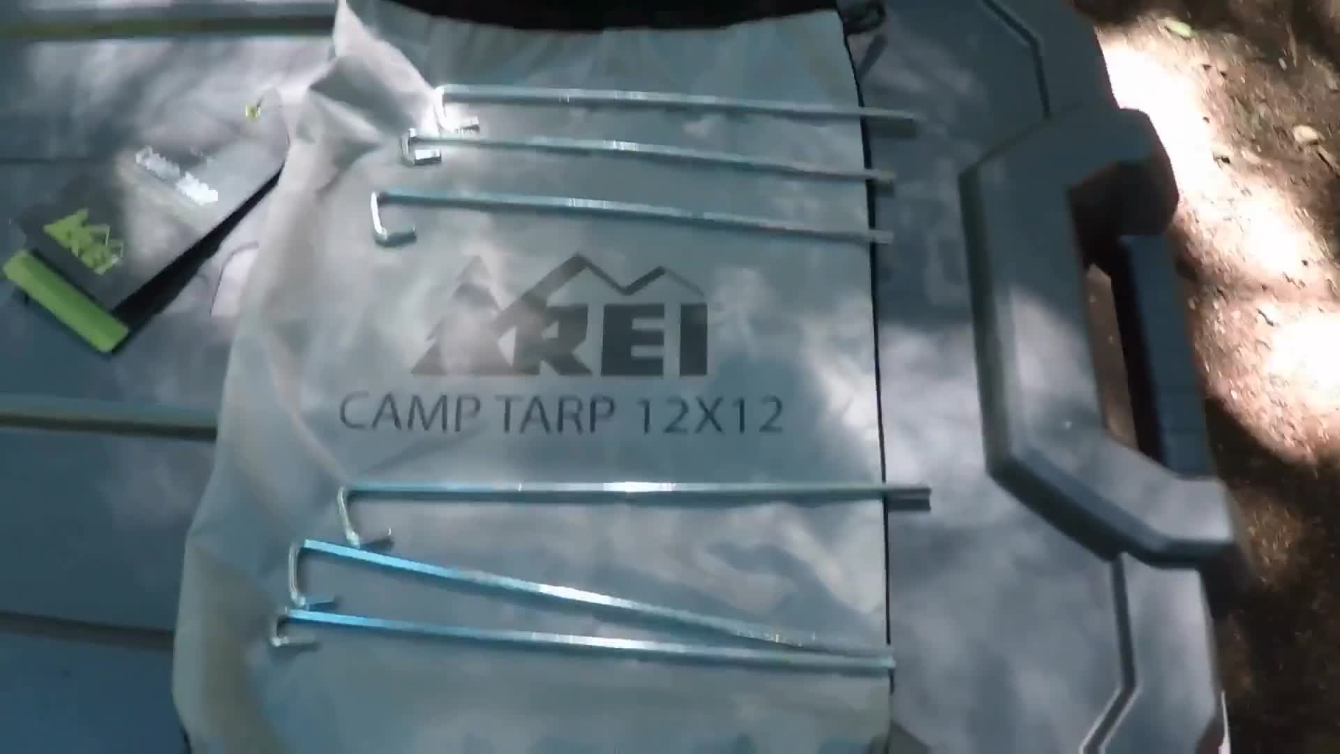 Close-up of the tarp and stakes.