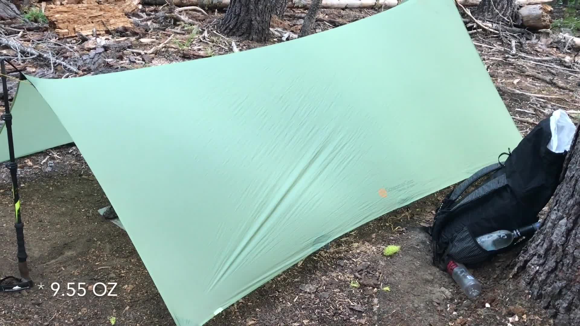 The speaker emphasizes the tarp's lightweight nature.