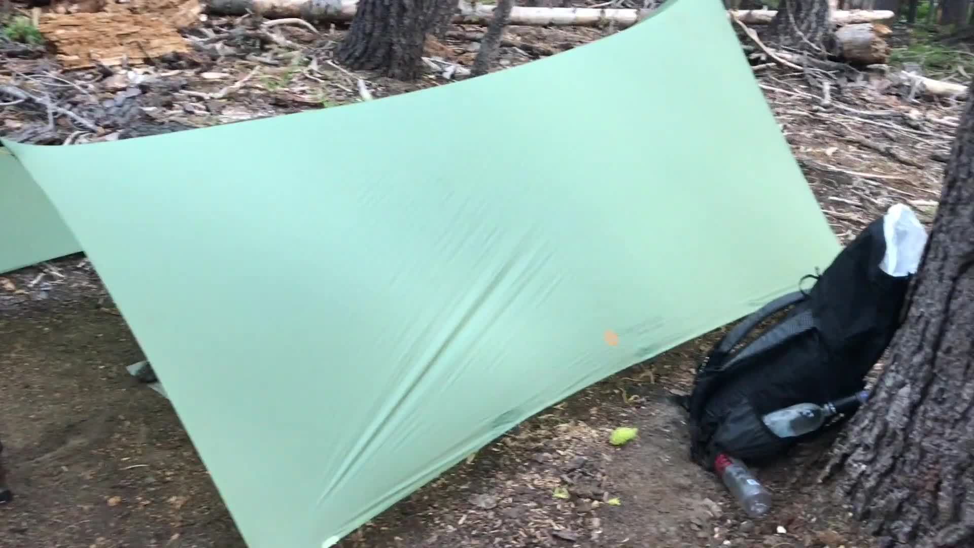 Close-up of the Gossamer Gear Twinn tarp being shown.