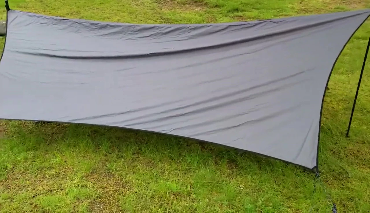 The tarp's weight is mentioned