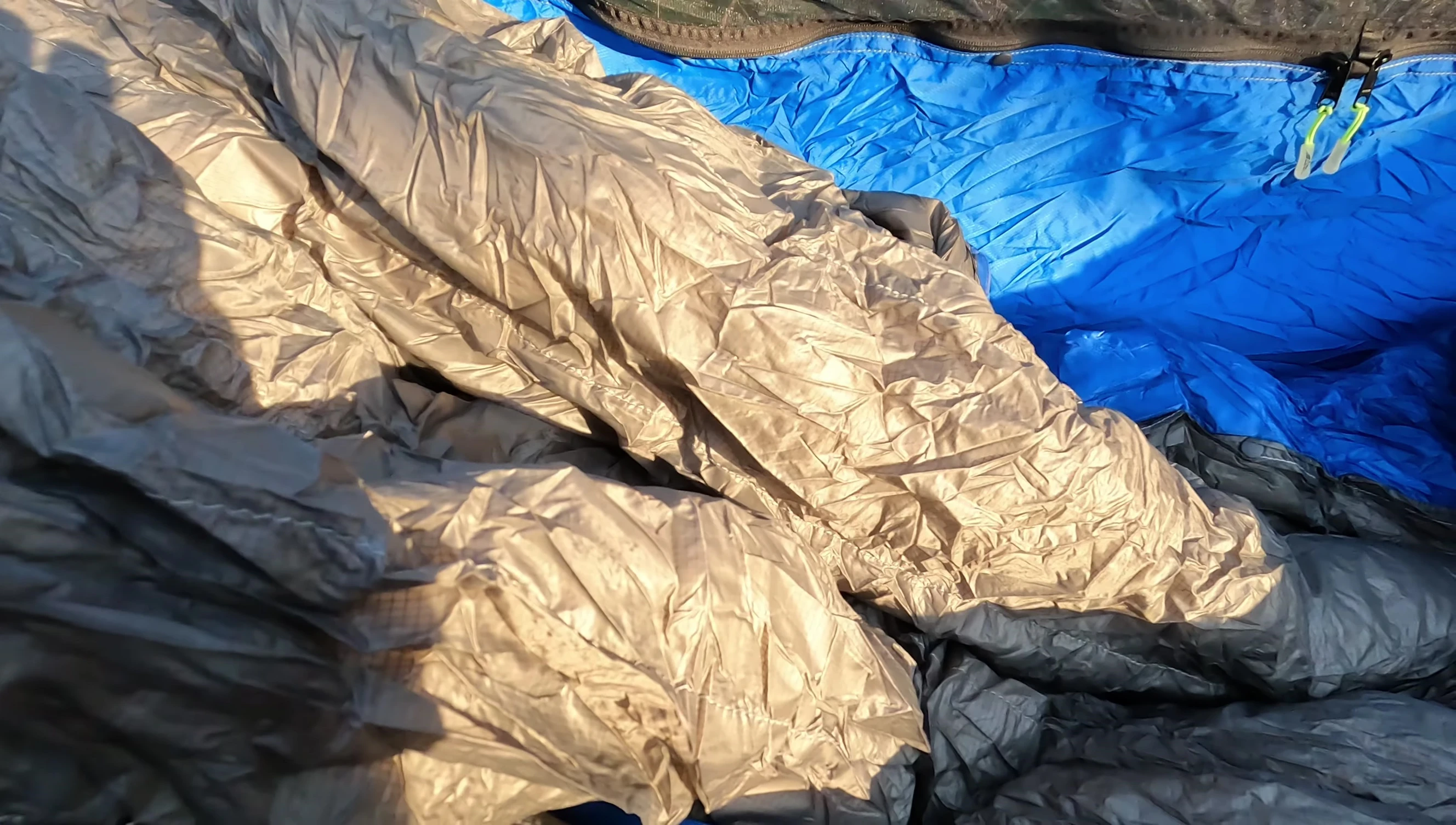 Demonstration of the top quilt's sleeping bag configuration.