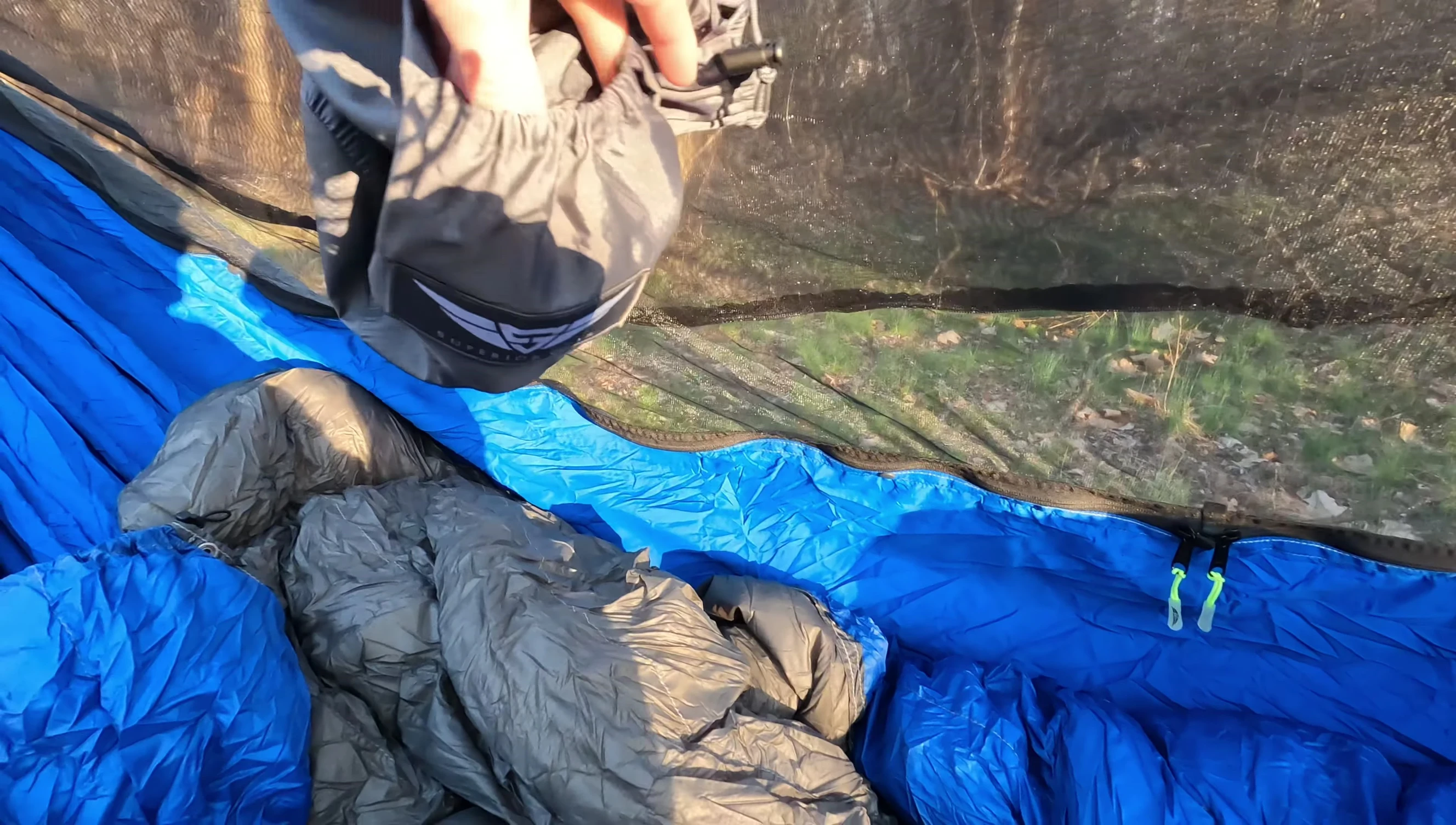 The stuff sack with an external pocket for storage.
