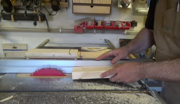Set the fence to cut 1-inch thick pieces. Rip each 2x4 into three 1-inch thick pieces. Then, re-cut each piece so the curved edge is pointing towards the fence, making them square.