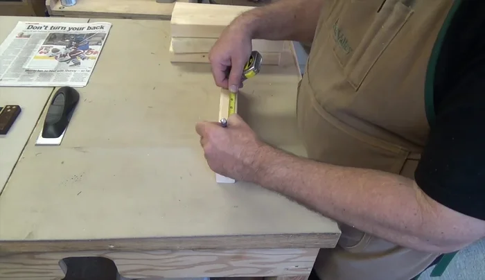 Cut a 45-degree notch at the marked 2-inch line. This will hold the tent rope. Adjust the stop to make the slot wide enough for your rope; it should be snug but not too tight.