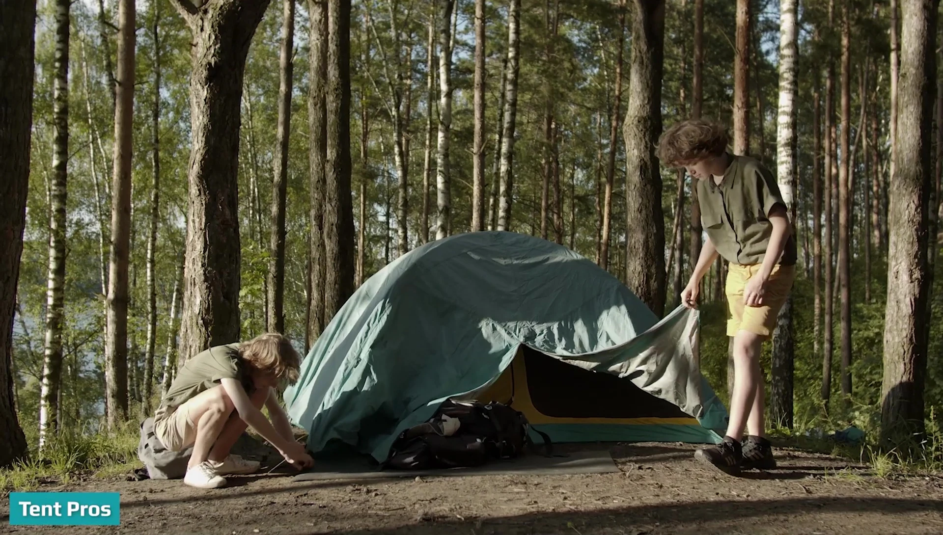 A person quickly setting up a tent