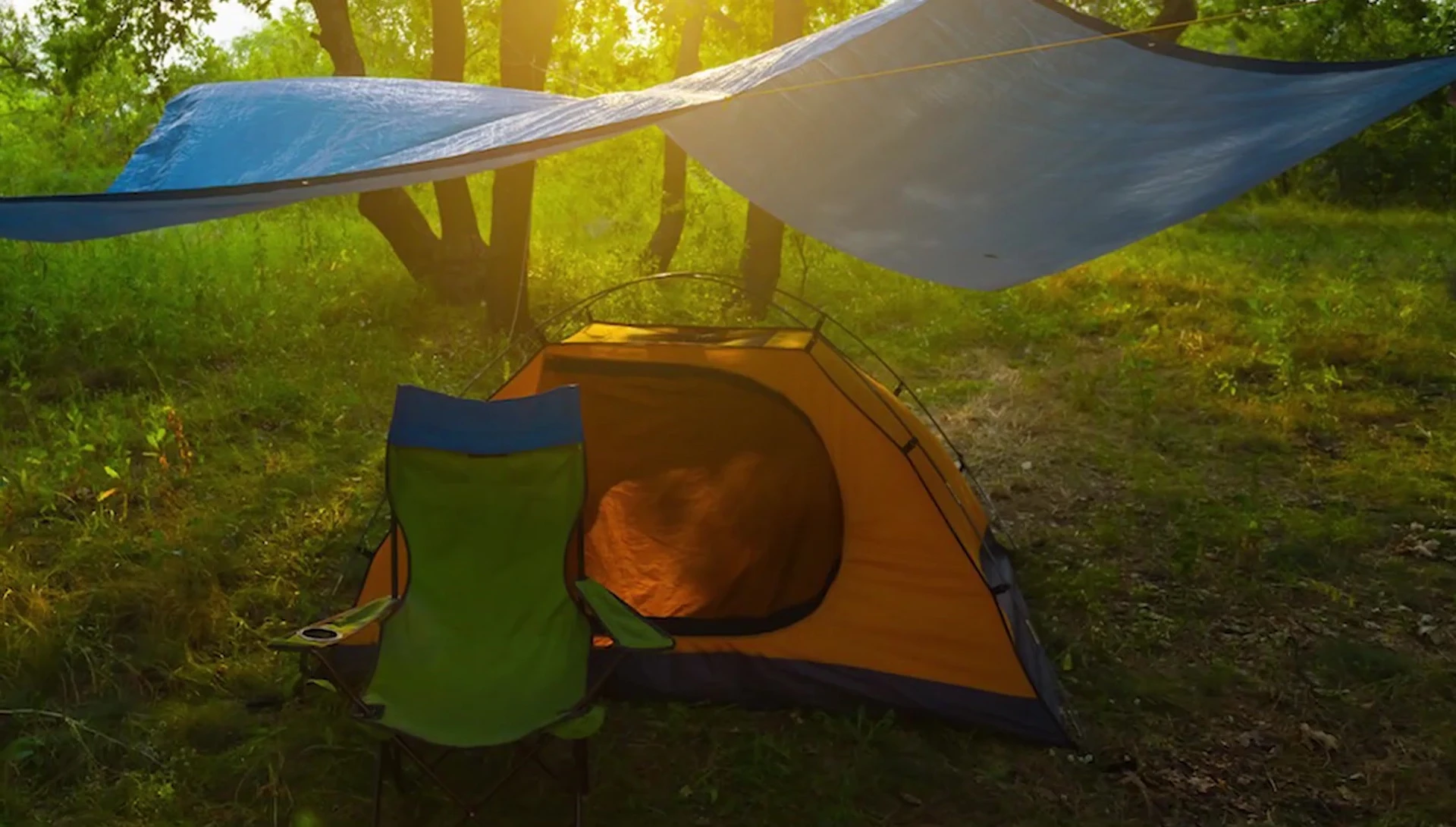 A packed-down tarp compared to other gear