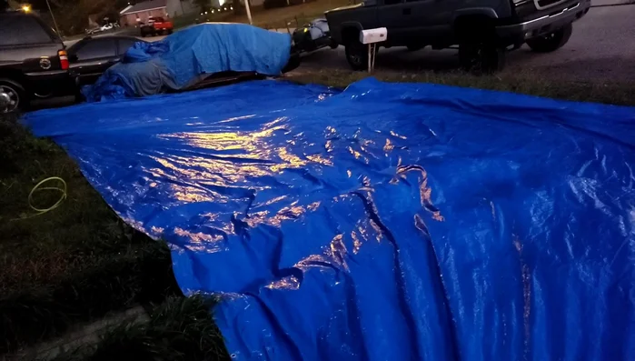 Fold and store the clean tarp.