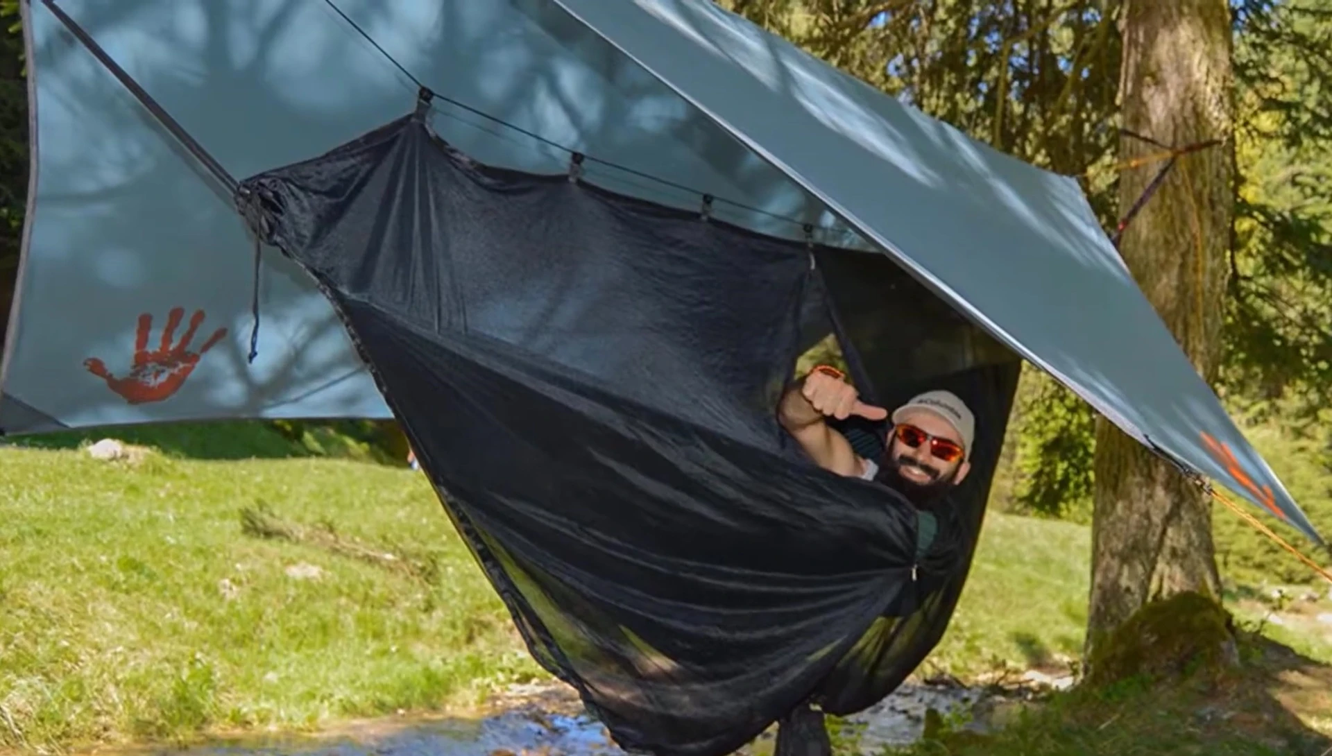 The tarp being used as a shelter