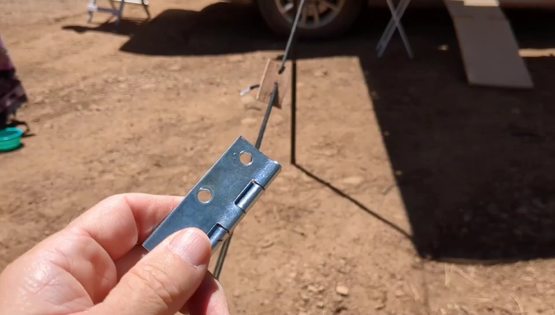 A small door hinge, presented as an alternative cleat option.