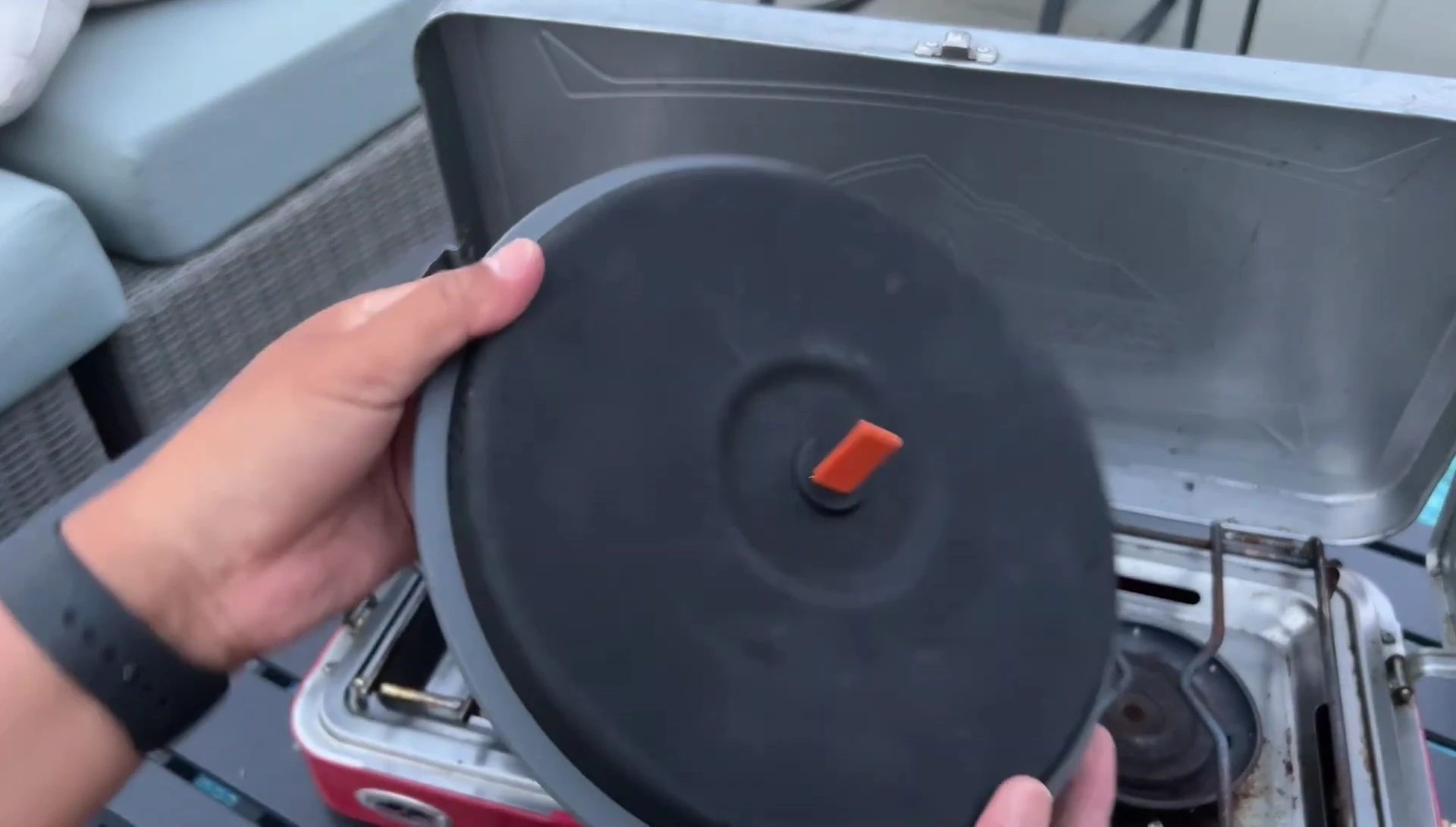 The strainer feature of the lid.