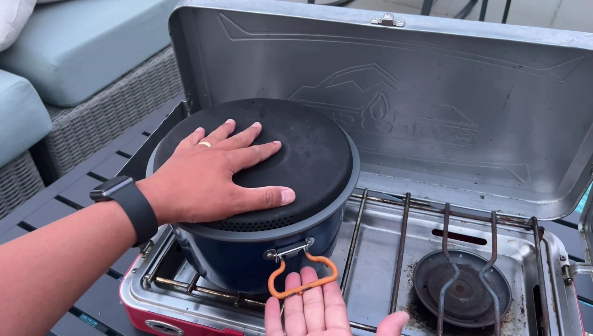 Close-up of the larger pot's foldable handles.