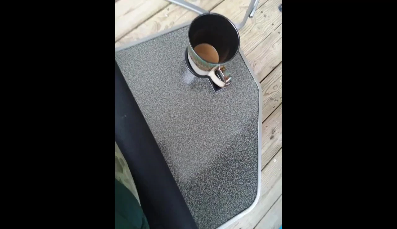 Highlighted carrying handles on the folded chair