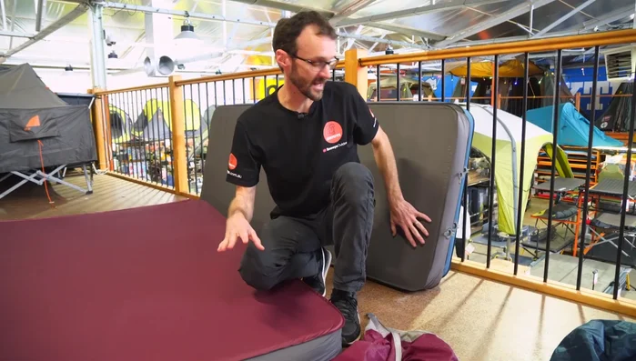 Unroll, then fold the mat in half again.