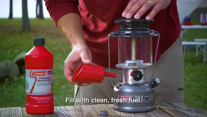 Replace and tighten the fuel caps on the lantern and fuel container. Wipe up any spilled fuel.