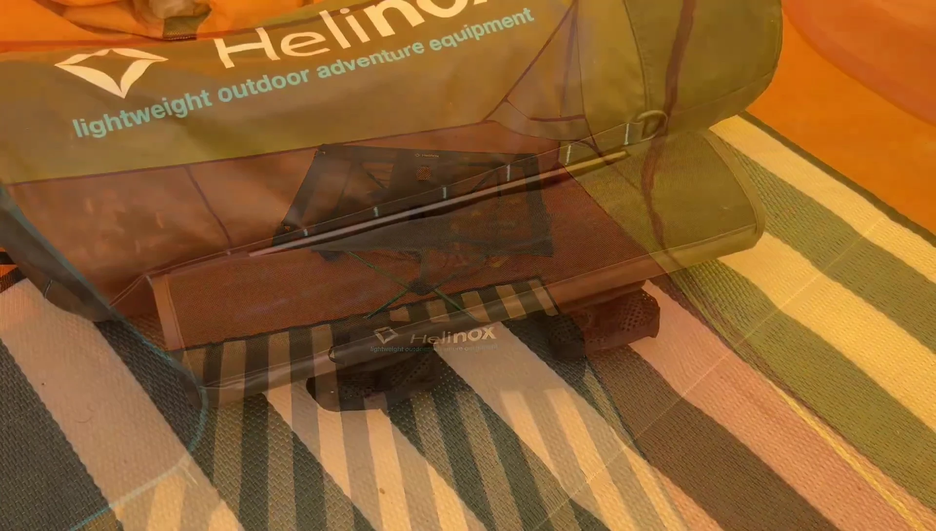 The folded Helinox table and its storage bag