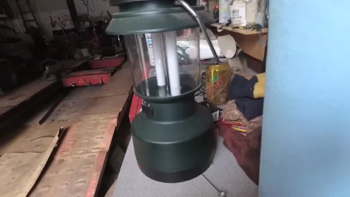 Gently remove the bottom base from the lantern body. Wiggle it until it comes loose.