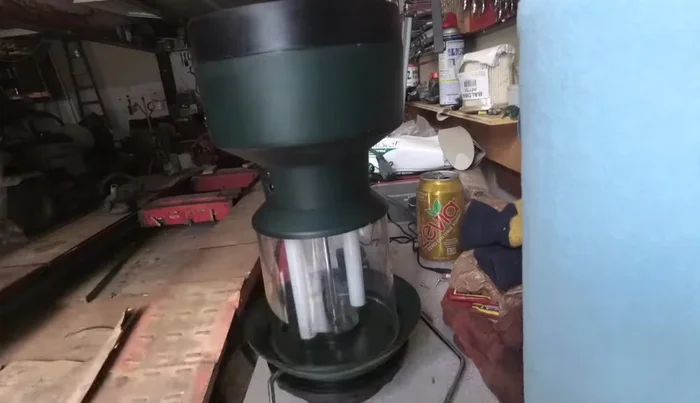 Gently remove the bottom base from the lantern body. Wiggle it until it comes loose.