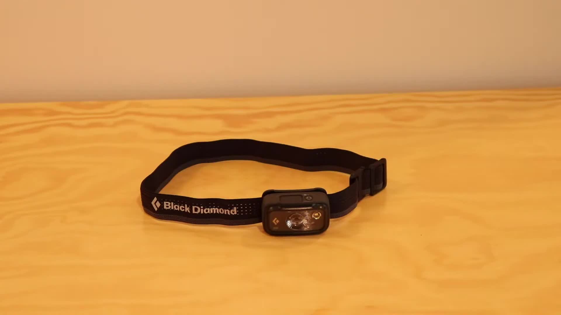 Close-up of the Black Diamond Spot headlamp being used