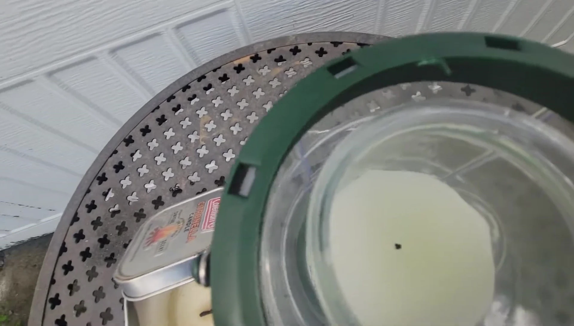 Close-up of the larger candle being lit.