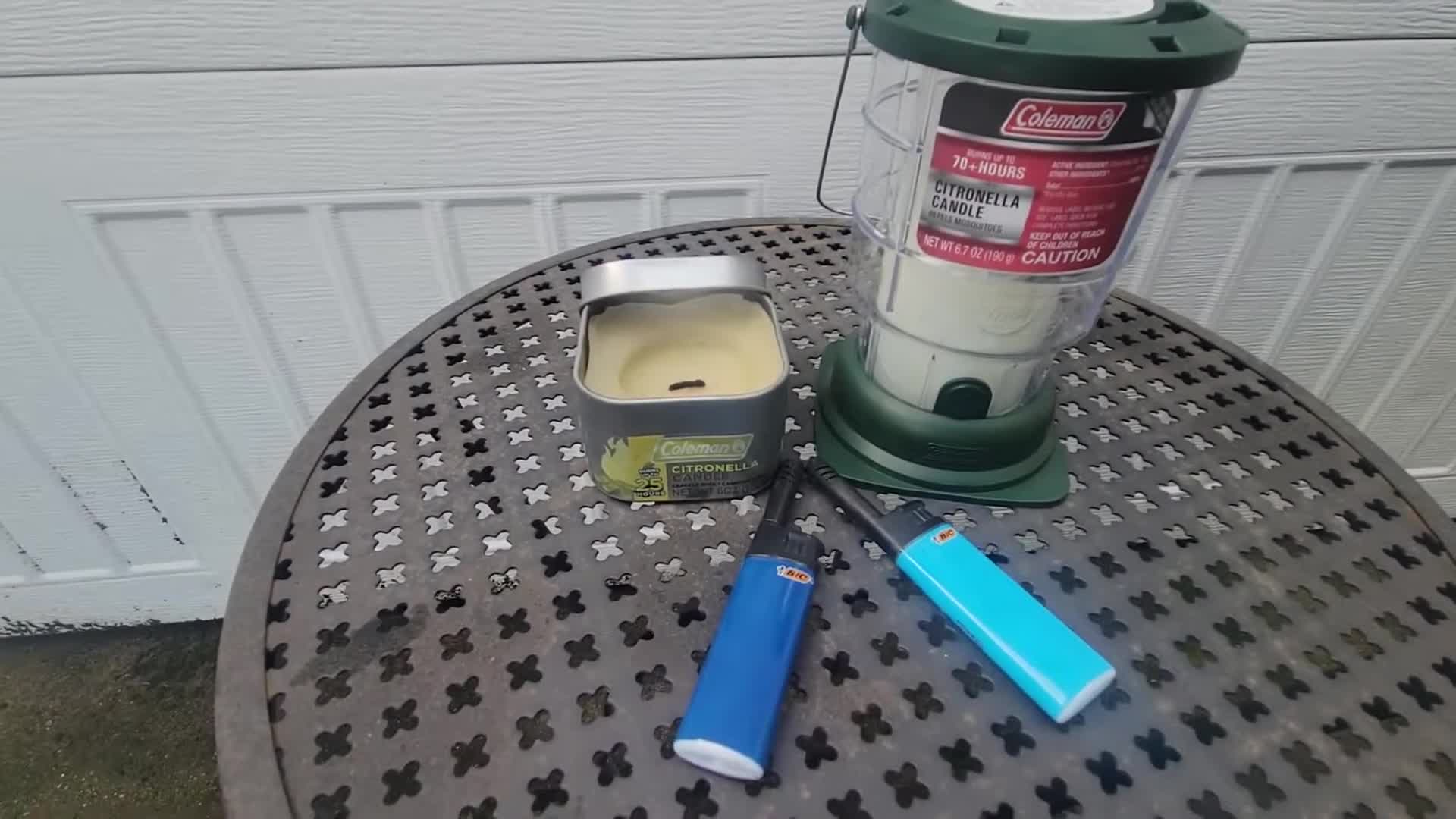 The newer, larger Coleman citronella candle in its glass jar.